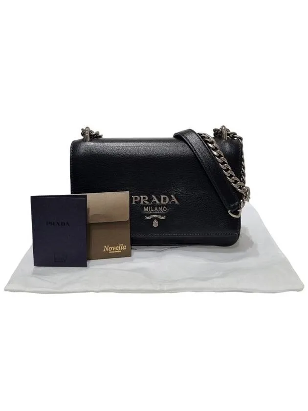1BD144 Black leather silver chain mini cross bag