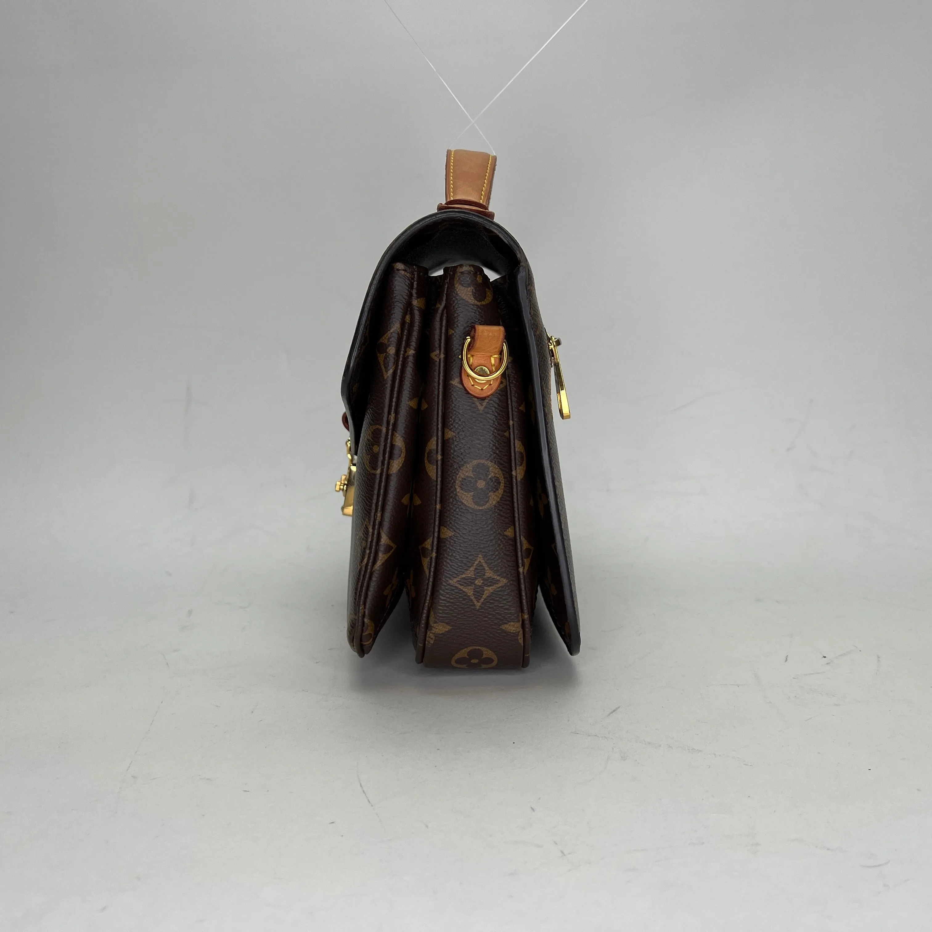 Metis Pochette Brown Crossbody Bag in Monogram Coated Canvas, Gold hardware
