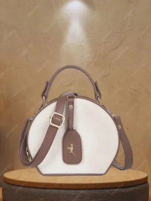 Women Off White Color Blocked Round Sling bag