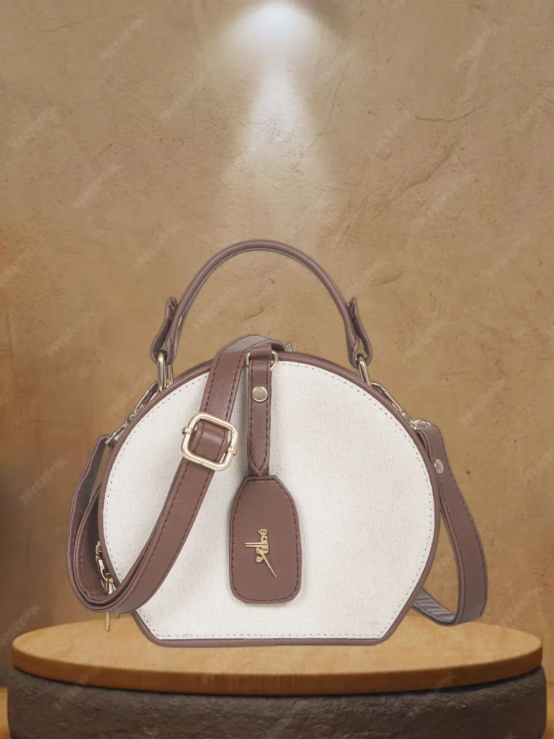 Women Off White Color Blocked Round Sling bag